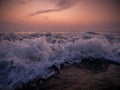 Sun set sky and crashing ocean waves Royalty Free Stock Photo