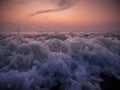 Sun set sky and crashing ocean waves Royalty Free Stock Photo