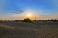 Sun set at Thar desert. Barren land ,sand dunes of Jaisalmer, Rajasthan, India Royalty Free Stock Photo