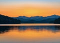 Sunset Over Lake With Mountains Royalty Free Stock Photo