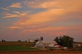 The sun sets on fertile farmland