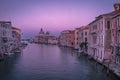 The sun sets over the Basilica and Grand Canal in Venice