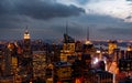 Sundown from the top of the rock - Empire State Building lit to the left of the frame in colour Royalty Free Stock Photo