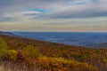 The Sun Sets Over the Blue Ridge Mountains on an Autumn Afternoon Highlighting the Beautiful Colors Royalty Free Stock Photo