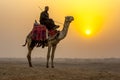 The sun sets over the Sahara Desert in Cairo, Egypt.