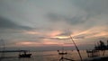 The sun sets in the Sunda Strait of Pandeglang, Banten Royalty Free Stock Photo