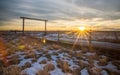 Sunset Behind Country Wooden Gated Driveway Entrance in Farm and Ranch Land of Colorado