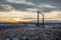 Sunset Behind Country Wooden Gated Driveway Entrance in Farm and Ranch Land of Colorado