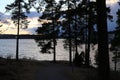 Sun is Setting Behind a Little Forest in Finland Royalty Free Stock Photo