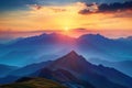 sun is setting behind the mountains, casting a warm glow over the landscape. sky is filled with clouds, creating a serene and Royalty Free Stock Photo