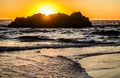 Sun Setting Behind a Seastack on the Oregon Coast