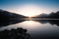 Sunset over snowy mountains and Lake Calacuccia in Corsica