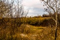 Sun setting on the fall colours around the lake. Battleford Provincial Park Saskatchewan Canada