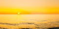 Sun Is Setting On Horizon At Sunset Sunrise Over Sea Or Ocean. Royalty Free Stock Photo