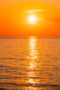 Sun Is Setting On Horizon At Sunset Sunrise Over Sea Or Ocean. Royalty Free Stock Photo