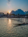 Sun setting on Nam Song River, Laos Royalty Free Stock Photo