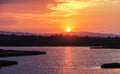 Sun setting over Baylands Nature Preserve Royalty Free Stock Photo
