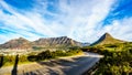 Sun setting over Cape Town, Table Mountain, Devils Peak, Lions Head and the Twelve Apostles Royalty Free Stock Photo