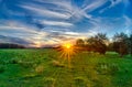 Sun setting over country farm land in york south carolina Royalty Free Stock Photo