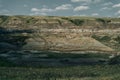 Sun setting over Dinosaur Provincial Park, a UNESCO World Heritage Site in Alberta, Canada. Royalty Free Stock Photo