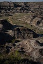 Sun setting over Dinosaur Provincial Park, a UNESCO World Heritage Site in Alberta, Canada. Royalty Free Stock Photo