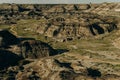 Sun setting over Dinosaur Provincial Park, a UNESCO World Heritage Site in Alberta, Canada. Royalty Free Stock Photo