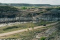 Sun setting over Dinosaur Provincial Park, a UNESCO World Heritage Site in Alberta, Canada. Royalty Free Stock Photo