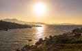 Sun setting over a Genoese tower and Calvi in Corsica Royalty Free Stock Photo