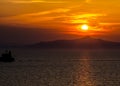 Setting Sun Behind a Greek Island