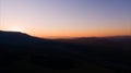 Sun setting over hills. Carpathian mountains in Ukraine