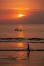 Sun setting over Indonesian fishermen - looking from Lombok towards Bali - portrait orientation