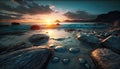 the sun is setting over the ocean with rocks in the foreground and water in the foreground, and a mo Royalty Free Stock Photo