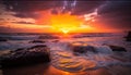 the sun is setting over the ocean with waves crashing on the shore and rocks in the foreground, and the sun setting over the Royalty Free Stock Photo