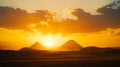 The sun is setting over the pyramids of Egypt Royalty Free Stock Photo