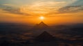 The sun is setting over the pyramids of Egypt Royalty Free Stock Photo
