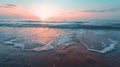 Sun setting over water at beach Royalty Free Stock Photo