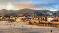 Sun setting on Pismo beach pier Royalty Free Stock Photo