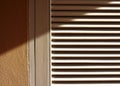 Abstract of line and shadow of sunlight on screen door. Royalty Free Stock Photo