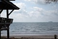 Sun shelter over looking beach with an island in the background Thailand