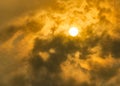 Sun shine red on cloudy sky Royalty Free Stock Photo