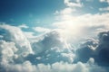 the sun shines through the clouds in the sky above the clouds in the sky are blue and white and there is a plane flying through Royalty Free Stock Photo