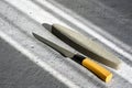The sun shines on the knife and whetstone Royalty Free Stock Photo