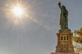 Sun shining on the Statue of Liberty, symbol of freedom. Royalty Free Stock Photo