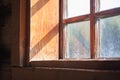 Sun shines through the window in the village house Royalty Free Stock Photo