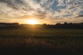 Sun shining on a rural countryside landscape sunrise Royalty Free Stock Photo