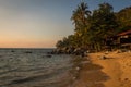 The sun shining on Melina Beach at sunset, Tiomen Island, Malaysia Royalty Free Stock Photo
