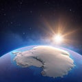 Sun shining over Antarctica from space Royalty Free Stock Photo
