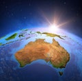 Sun shining over Australia from space Royalty Free Stock Photo