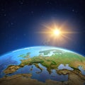 Sun shining over the Earth from space Royalty Free Stock Photo