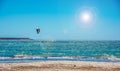 Sun shining over a kite surfer in Alghero shore Royalty Free Stock Photo